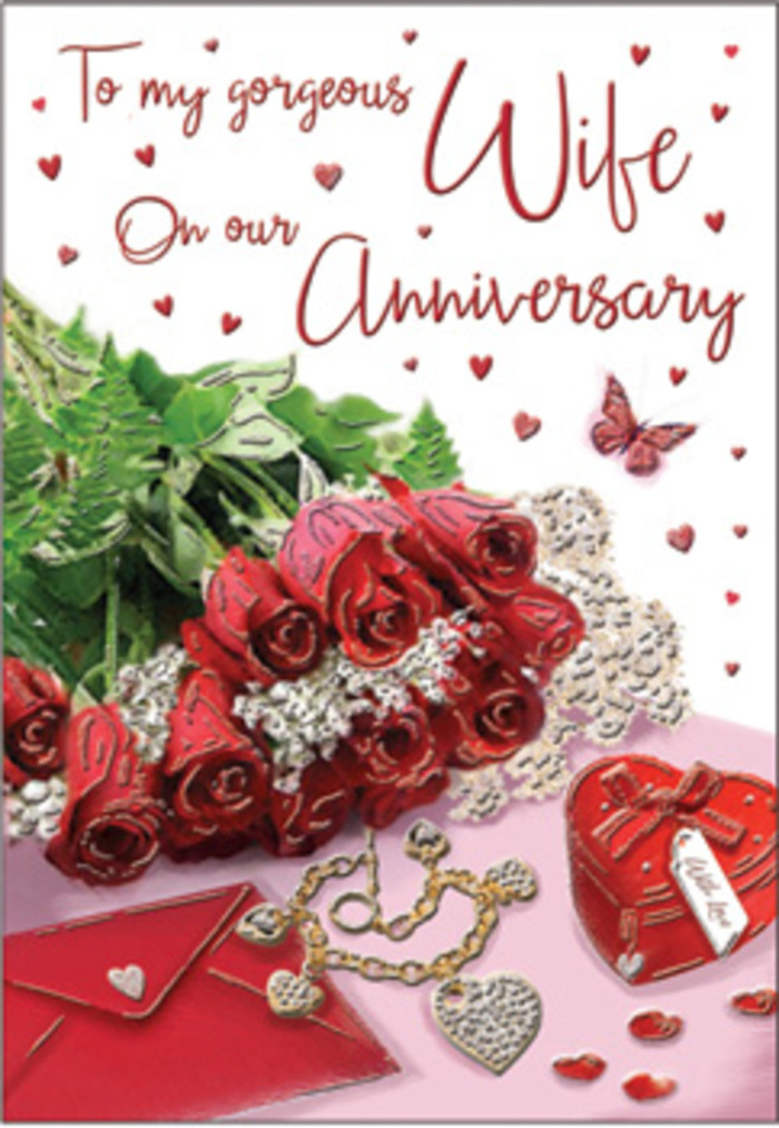 A richly detailed anniversary card design captures the essence of a romantic celebration in Gants Hill, rendered as an intimate still life. At the centre, a cluster of classic red roses immediately draws the gaze; each bloom is fully opened and deeply layered, the velvety petals swirling inward in luxurious spirals. The intense crimson hue of the roses is offset by fresh green foliage, which curves and fans around them, adding a sense of balance and natural movement, as if gently arranged by an experienced local florist. To one side rests a neatly placed envelope, its soft, neutral tone providing a calm backdrop that suggests personal, handwritten words waiting inside. Beside it, a shiny heart-shaped box in a vivid red tone captures the light, its smooth contours evoking both excitement and tenderness, hinting at jewellery or a cherished token nestled within. A fine piece of jewellery is positioned close to the roses, its delicate metalwork catching subtle highlights and reinforcing the idea of treasured anniversaries and thoughtful gifts. Scattered across the card's surface are tiny hearts and sparkling decorative accents, artfully arranged like the remnants of a joyful celebration, while a single small butterfly hovers in the design, adding grace and an air of gentle transformation. The scripted anniversary message flows in elegant, sweeping letters, harmonising with the floral and decorative details rather than overpowering them. Soft, diffused light bathes the entire arrangement, creating gentle shadows and a peaceful glow that feels at home in the quiet streets and cosy interiors of Gants Hill. The scene conveys warmth, devotion, and the comfortable beauty of love that has weathered many seasons together.